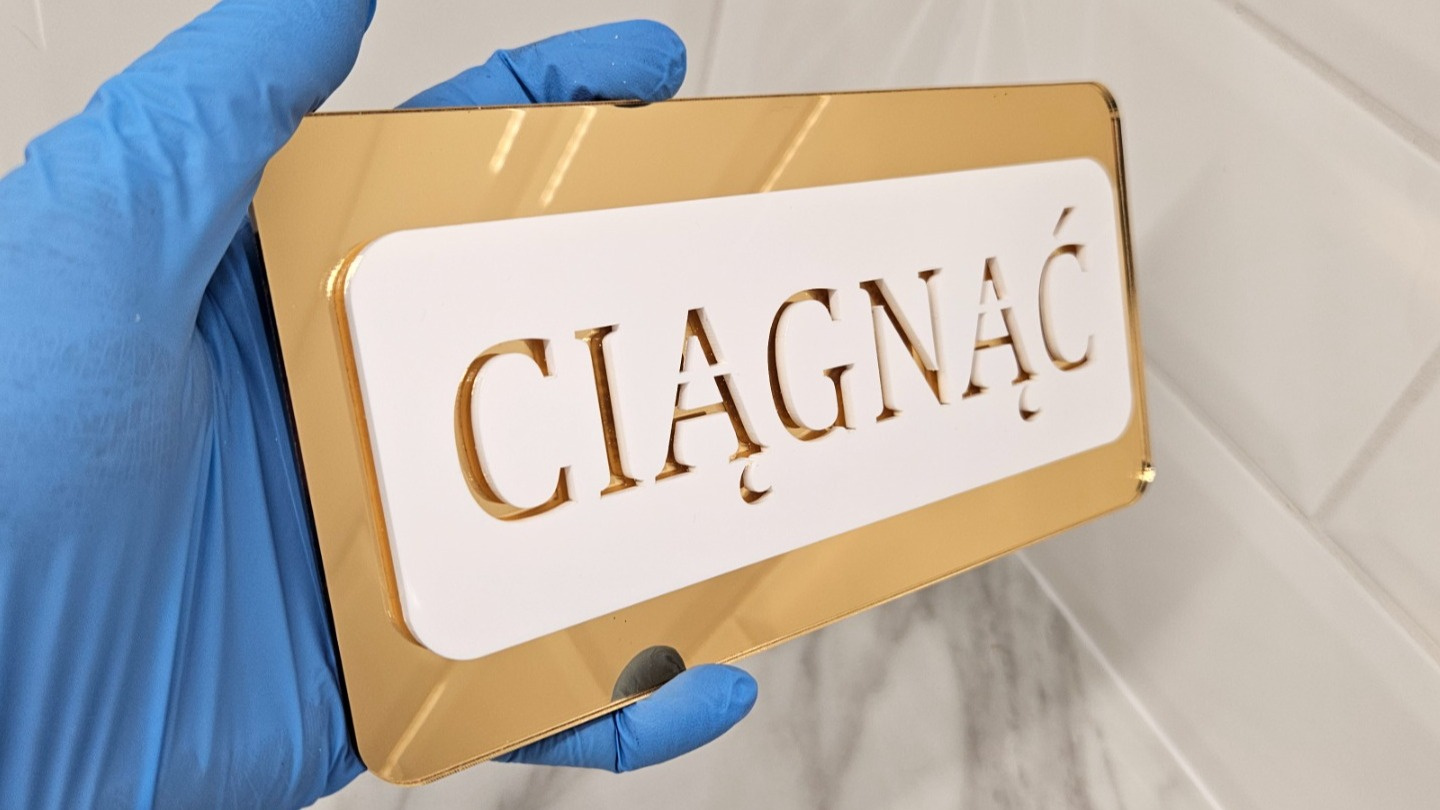 Tabliczka-ciagnac-1